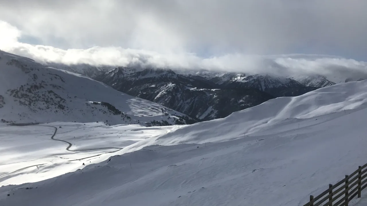 A road winding through the snow-covered mountains at Baqueira Beret