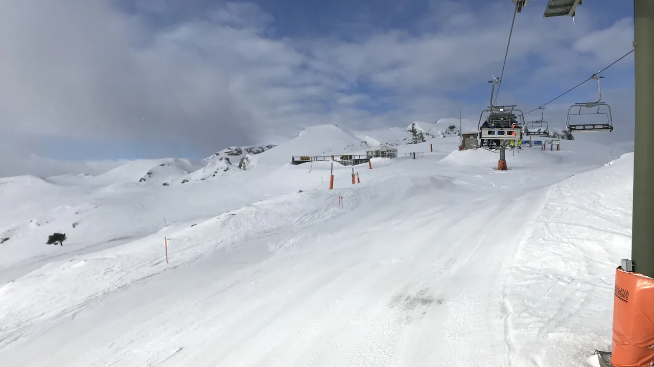 A skier on fresh snow at Baqueira Beret, high in the Val d'Aran