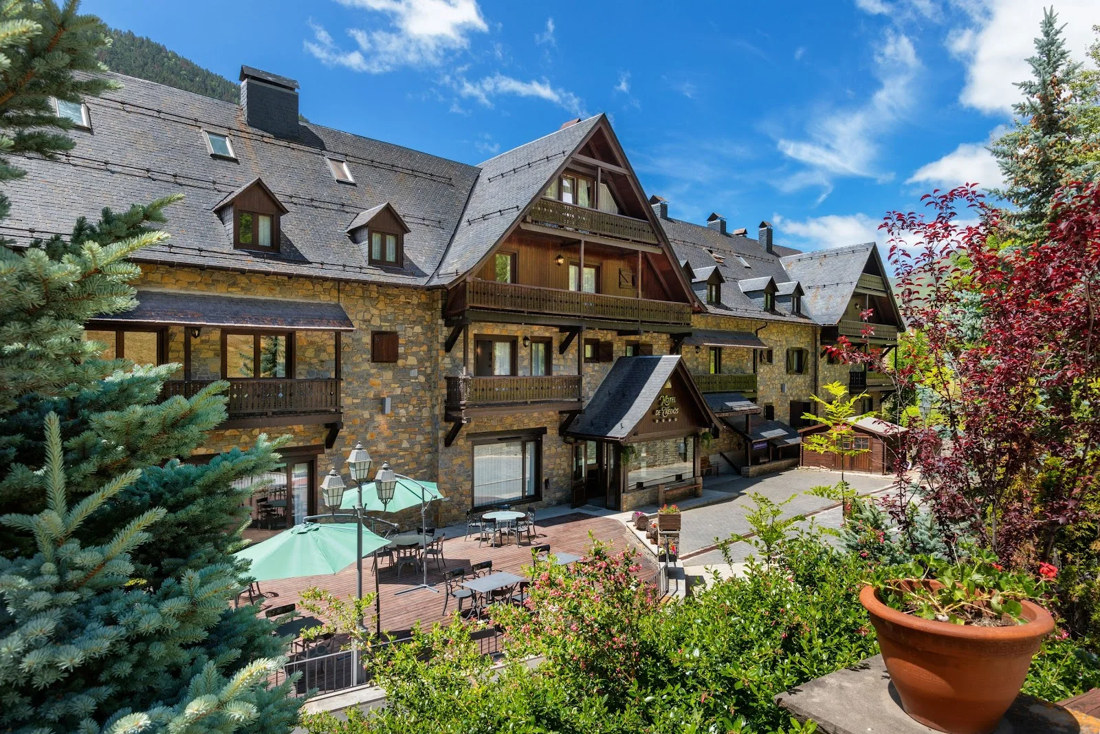The stone-and-slate chalet facade of the Meliá de Tredós hotel on the road to Baqueira