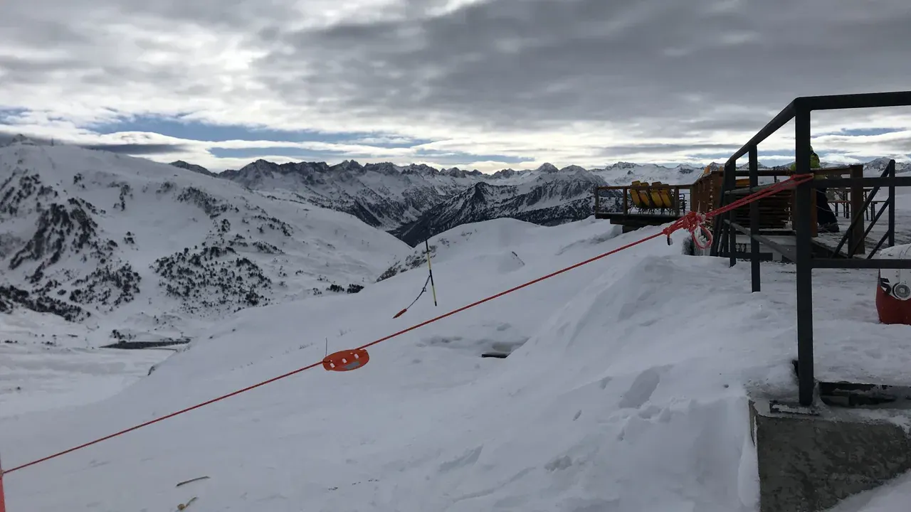 A mountain restaurant terrace at Baqueira Beret looking out over the Pyrenees