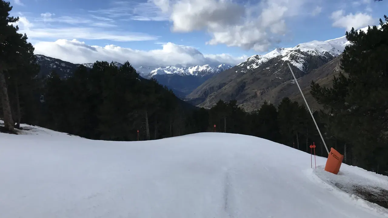 A groomed piste at Baqueira Beret running down towards the Val d'Aran