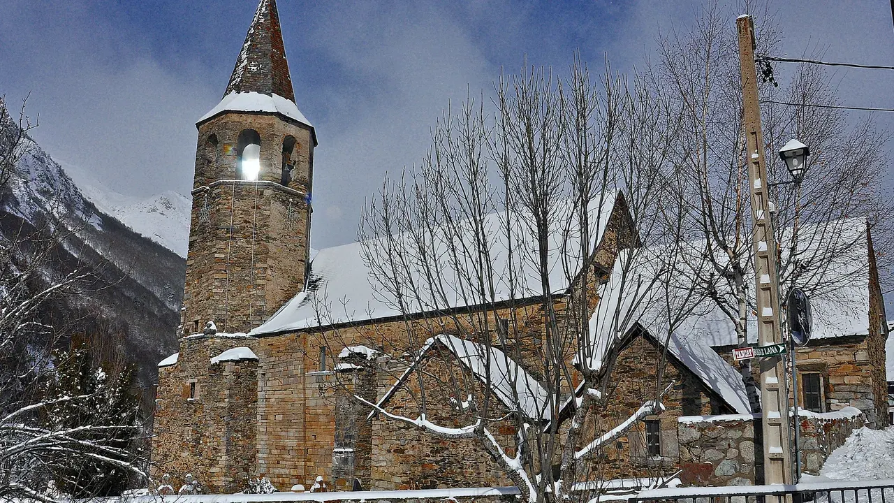 The church of Sant Fèlix in Bagergue under winter snow