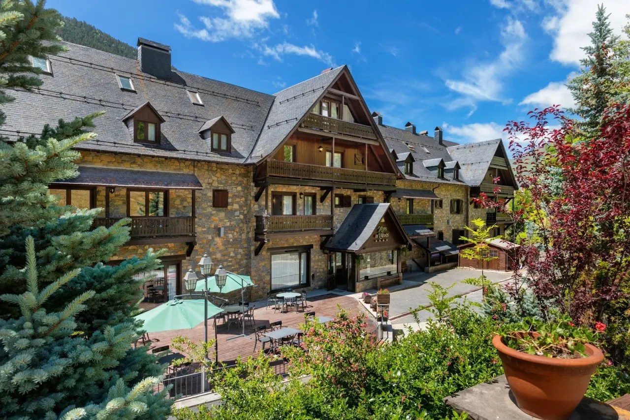 The stone-and-slate chalet facade of the Meliá de Tredós hotel on the road to Baqueira